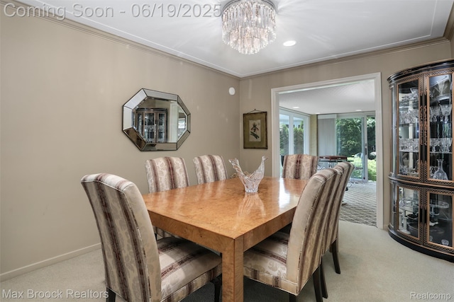 25845 Salem Rd, Huntington Woods, MI 48070 - dining space featuring light colored carpet, a chandelier, and crown molding