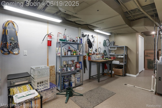 25845 Salem Rd, Huntington Woods, MI 48070 - basement featuring a workshop area and baseboards