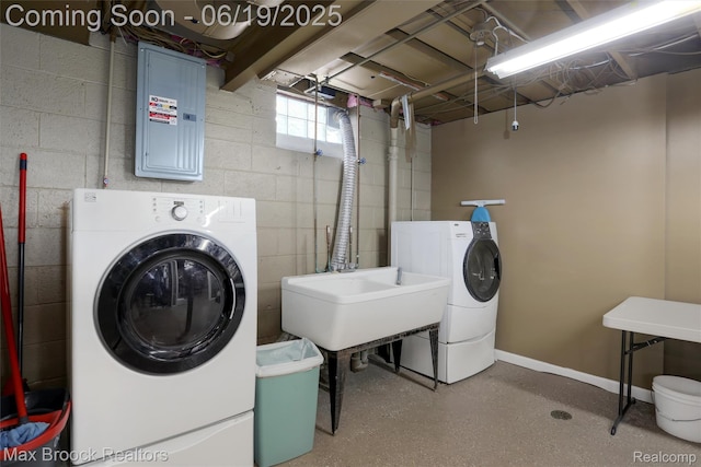 25845 Salem Rd, Huntington Woods, MI 48070 - laundry area featuring electric panel, separate washer and dryer, and concrete block wall