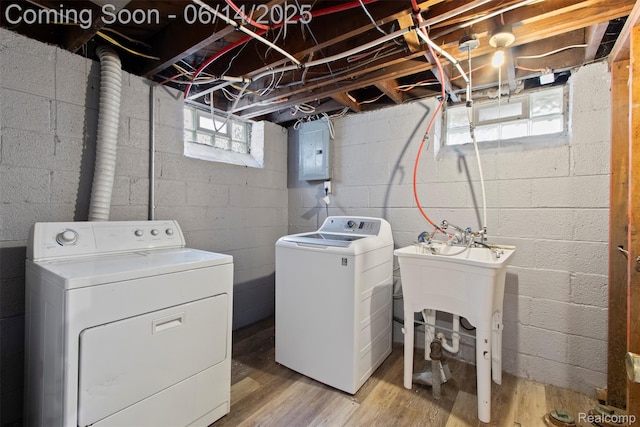16136 Whitcomb St, Detroit, MI 48235 - laundry room with separate washer and dryer, electric panel, and light wood-type flooring