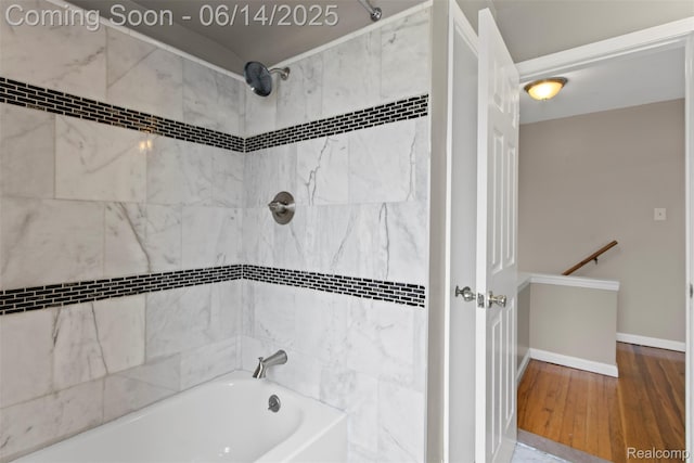 16136 Whitcomb St, Detroit, MI 48235 - bathroom with shower / bathtub combination and wood finished floors