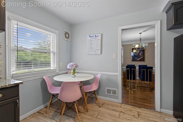 16136 Whitcomb St, Detroit, MI 48235 - dining space with a chandelier and light wood-type flooring