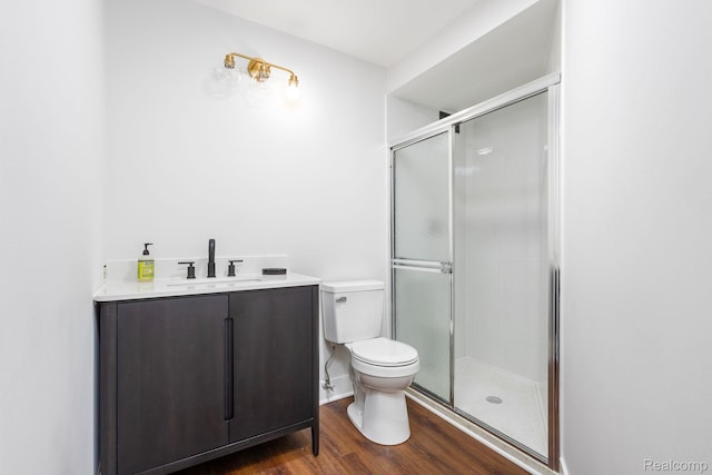 5000 Town Ctr Unit 2001, Southfield, MI 48075 - full bathroom with a shower stall, vanity, and wood finished floors