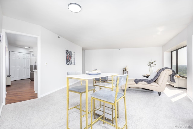 5000 Town Ctr Unit 2001, Southfield, MI 48075 - dining area featuring carpet flooring and baseboards