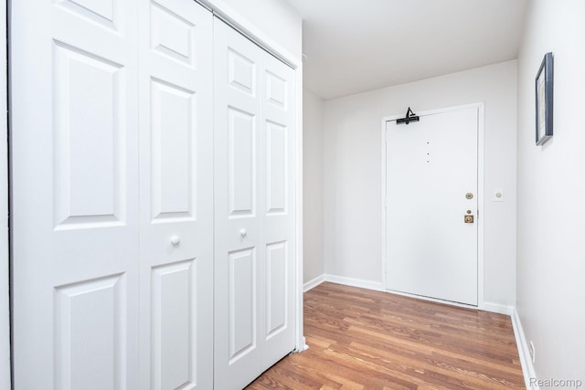 5000 Town Ctr Unit 2001, Southfield, MI 48075 - hallway with light wood-type flooring and baseboards