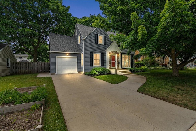 1115 Keneberry Way SE, East Grand Rapids, MI 49506 - view of front of home featuring concrete driveway, an attached garage, and a shingled roof