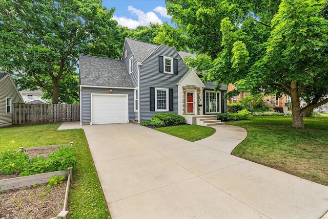 1115 Keneberry Way SE, East Grand Rapids, MI 49506 - view of front facade with an attached garage, driveway, and a shingled roof
