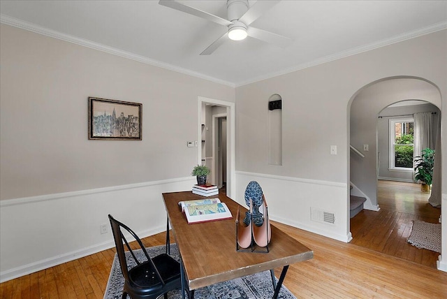 1115 Keneberry Way SE, East Grand Rapids, MI 49506 - home office with hardwood / wood-style flooring, arched walkways, ornamental molding, and ceiling fan