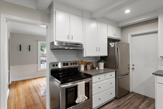 1115 Keneberry Way SE, East Grand Rapids, MI 49506 - kitchen featuring appliances with stainless steel finishes, under cabinet range hood, wood finished floors, white cabinets, and beam ceiling