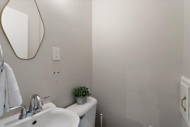 1115 Keneberry Way SE, East Grand Rapids, MI 49506 - bathroom featuring a sink and toilet