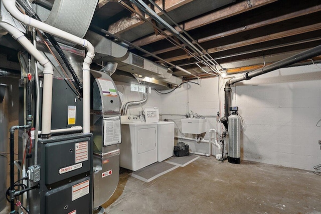 1115 Keneberry Way SE, East Grand Rapids, MI 49506 - unfinished basement featuring independent washer and dryer and a water softener system