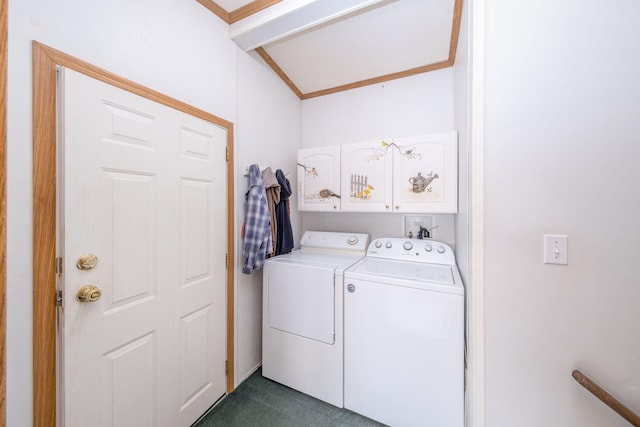 19275 N Coates Hwy, Brethren, MI 49619 - laundry area with cabinet space, washing machine and dryer, dark carpet, and ornamental molding
