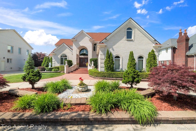 13205 Van Pamel Dr, Shelby Twp, MI 48315 - view of front of home featuring brick siding