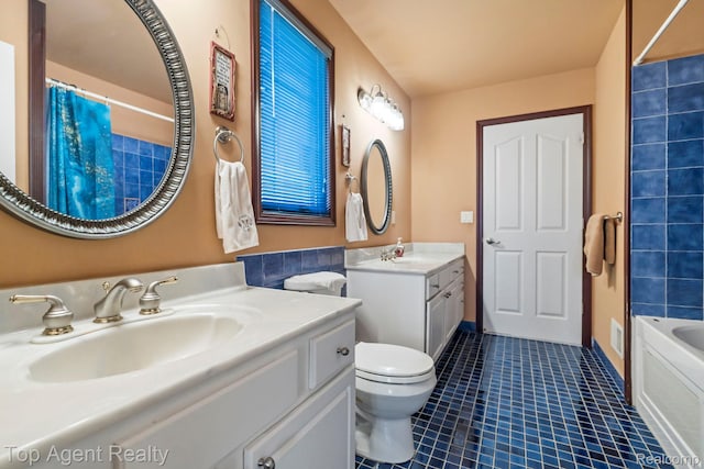 13205 Van Pamel Dr, Shelby Twp, MI 48315 - bathroom featuring vanity, tile patterned floors, and shower / bath combo with shower curtain