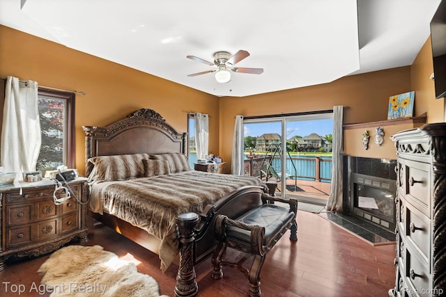 13205 Van Pamel Dr, Shelby Twp, MI 48315 - bedroom featuring access to outside, wood finished floors, and a ceiling fan