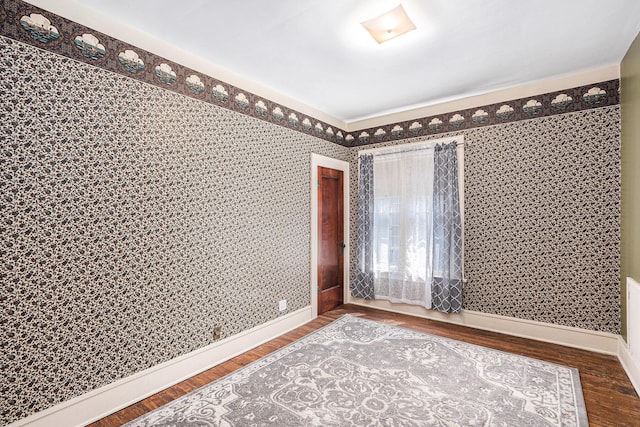 106 E Mechanic St, Yale, MI 48097 - unfurnished room featuring wood finished floors and baseboards