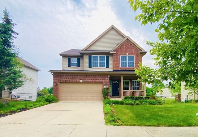 1924 Savannah Ln, Ypsilanti, MI 48198 - view of front of home featuring a garage, brick siding, a porch, and driveway