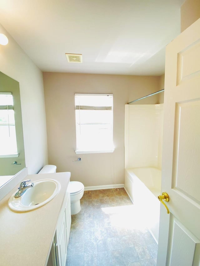 1924 Savannah Ln, Ypsilanti, MI 48198 - bathroom featuring vanity, plenty of natural light, and bathtub / shower combination