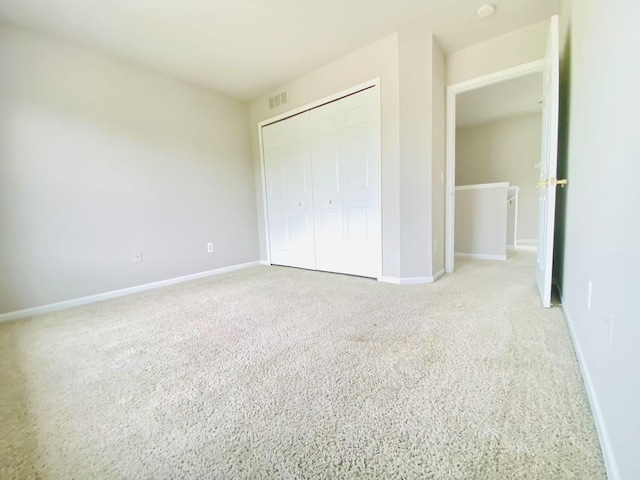 1924 Savannah Ln, Ypsilanti, MI 48198 - unfurnished bedroom featuring a closet and carpet flooring