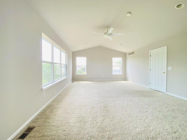 1924 Savannah Ln, Ypsilanti, MI 48198 - carpeted empty room featuring lofted ceiling, ceiling fan, and a smoke detector