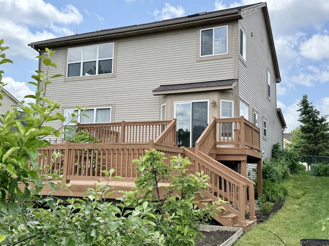 1924 Savannah Ln, Ypsilanti, MI 48198 - rear view of property featuring a wooden deck, stairway, and a yard