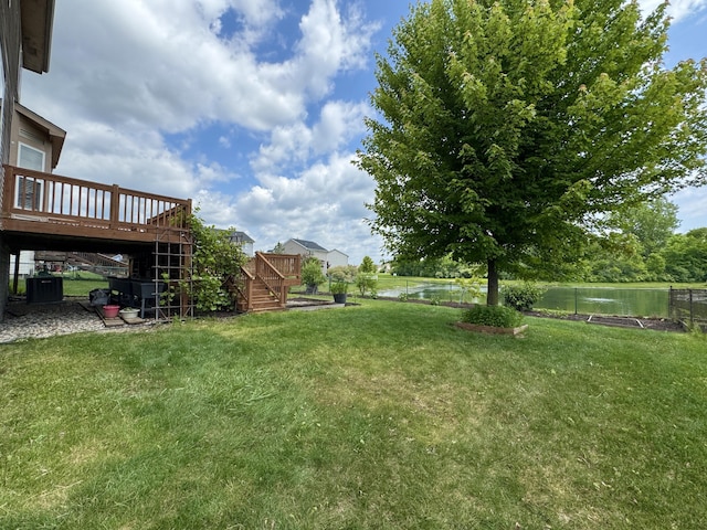 1924 Savannah Ln, Ypsilanti, MI 48198 - view of yard featuring stairs and a deck with water view