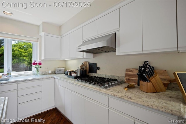 22025 Orchard Way, Beverly Hills, MI 48025 - kitchen with extractor fan, stainless steel gas cooktop, white cabinets, dark wood-style floors, and light stone countertops