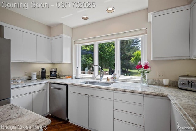22025 Orchard Way, Beverly Hills, MI 48025 - kitchen with dishwasher, white cabinets, dark wood-style flooring, light stone countertops, and recessed lighting