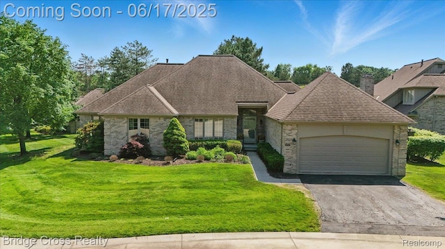22025 Orchard Way, Beverly Hills, MI 48025 - view of front of property featuring a front lawn, a garage, and roof with shingles