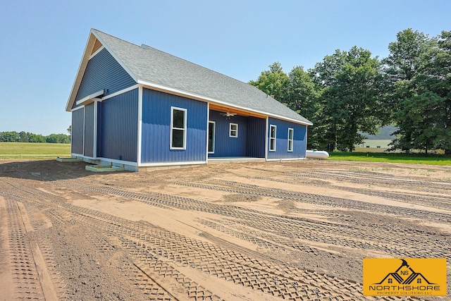3973 W Harrison Rd, Hart, MI 49420 - back of property with a shingled roof