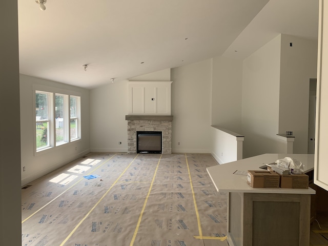3094 Timberpine Ave, Holland, MI 49424 - living room with lofted ceiling and a stone fireplace