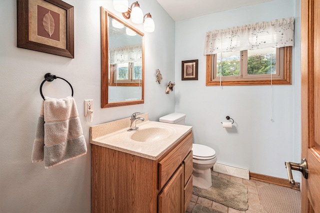 13278 W Stanton Rd, Trufant, MI 49347 - bathroom with vanity and a baseboard radiator