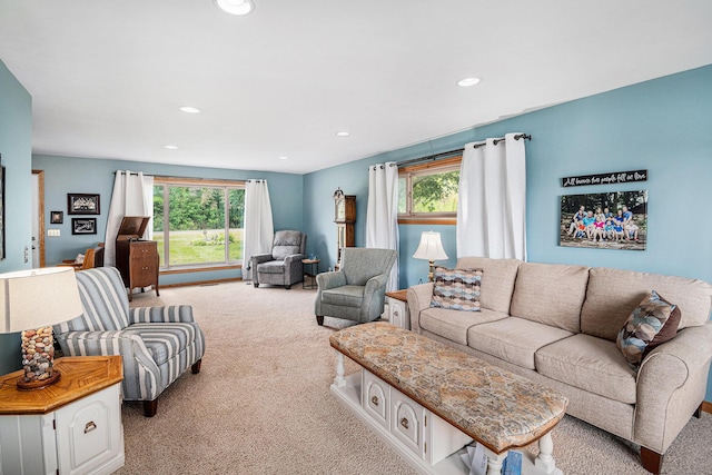 13278 W Stanton Rd, Trufant, MI 49347 - carpeted living room with healthy amount of natural light and recessed lighting