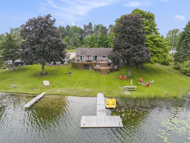 13278 W Stanton Rd, Trufant, MI 49347 - dock featuring a yard and a deck with water view