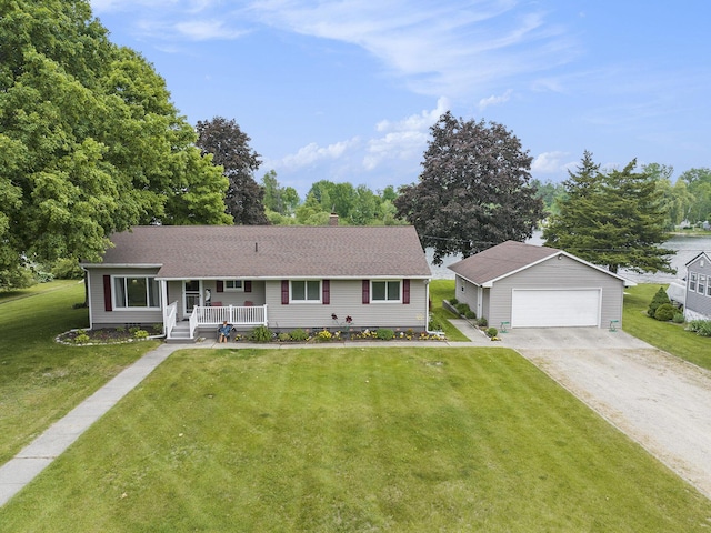 13278 W Stanton Rd, Trufant, MI 49347 - ranch-style home with covered porch, an outdoor structure, a garage, a front yard, and a chimney
