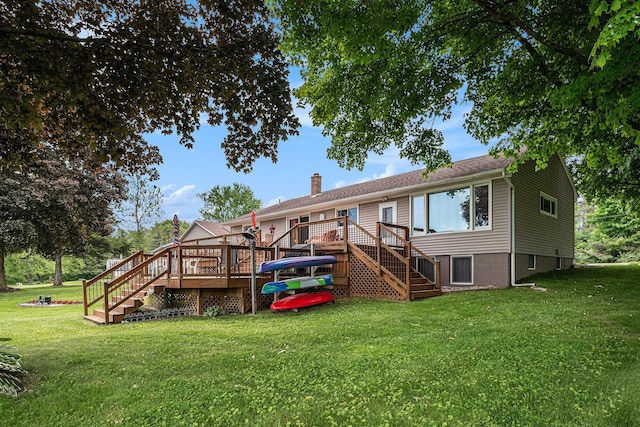 13278 W Stanton Rd, Trufant, MI 49347 - rear view of property with stairway, a deck, a chimney, and a lawn