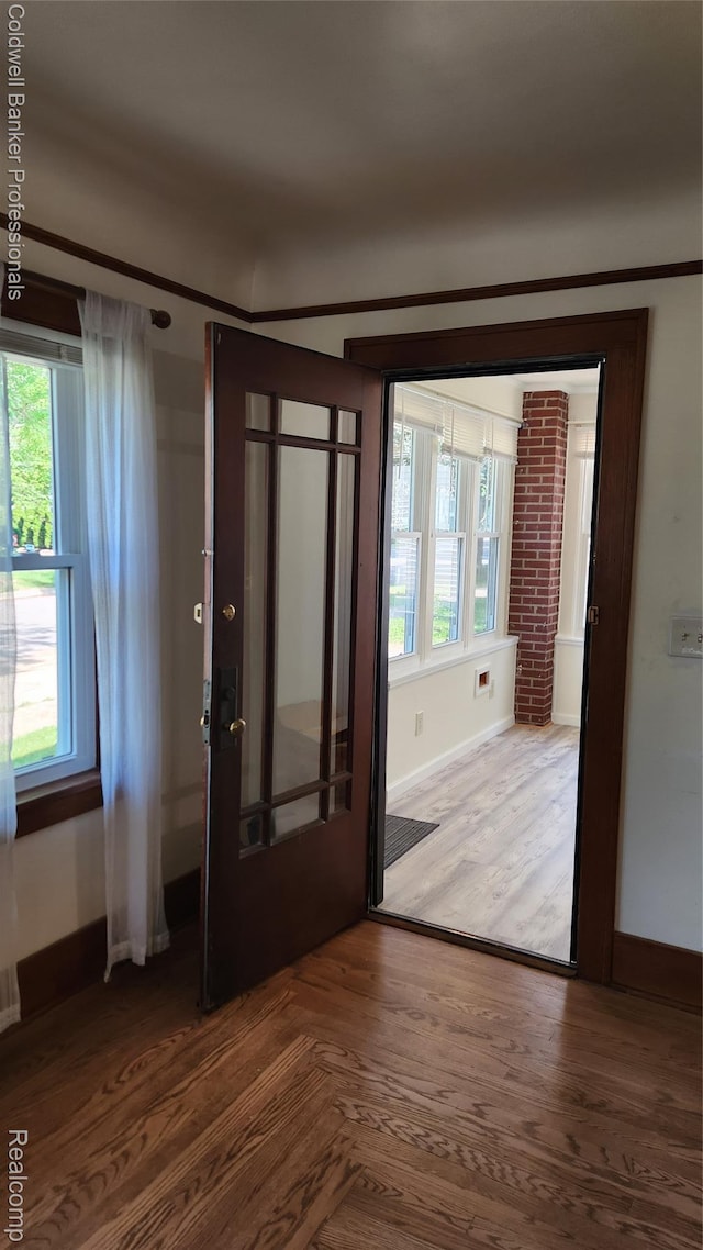 1020 N Monroe St, Lapeer, MI 48446 - foyer featuring healthy amount of natural light and wood finished floors