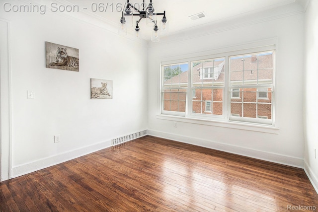 2701 Tuxedo St, Detroit, MI 48206 - empty room with a chandelier, crown molding, and dark wood-style flooring
