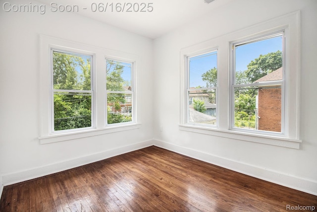 2701 Tuxedo St, Detroit, MI 48206 - unfurnished room featuring baseboards and dark wood-style floors
