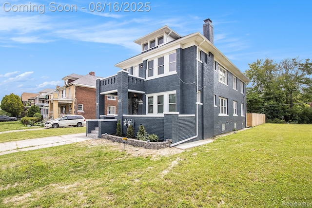 2701 Tuxedo St, Detroit, MI 48206 - view of property exterior with brick siding, a chimney, and a yard