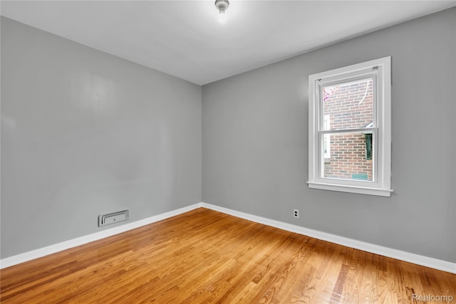 13513 Chestnut St, Southgate, MI 48195 - unfurnished room featuring baseboards and wood finished floors