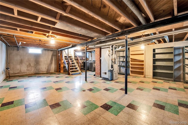 13513 Chestnut St, Southgate, MI 48195 - basement featuring stairway, tile patterned floors, and heating unit