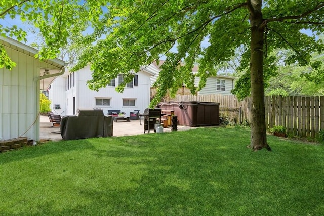 2885 Bluff St, Stevensville, MI 49127 - fenced yard featuring a hot tub, a patio area, and an outdoor living space