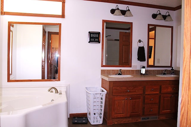143 Tree Stand Rd, Rose City, MI 48654 - full bathroom featuring double vanity and a garden tub
