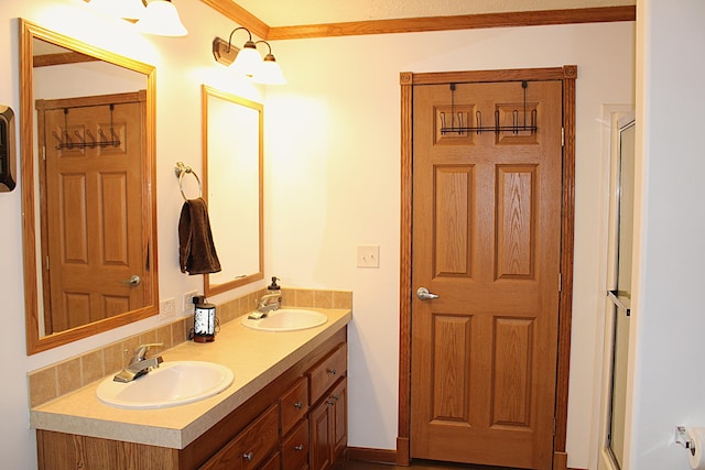 143 Tree Stand Rd, Rose City, MI 48654 - bathroom with double vanity, a shower with shower door, and crown molding