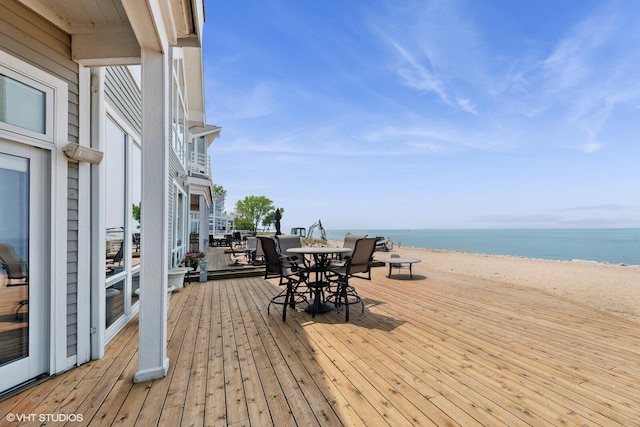 400 Lake Dr Unit C, New Buffalo, MI 49117 - wooden terrace with view of water and beach and outdoor dining area