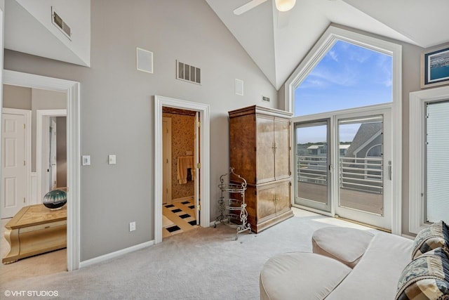 400 Lake Dr Unit C, New Buffalo, MI 49117 - carpeted bedroom with access to outside, high vaulted ceiling, ensuite bathroom, and a ceiling fan