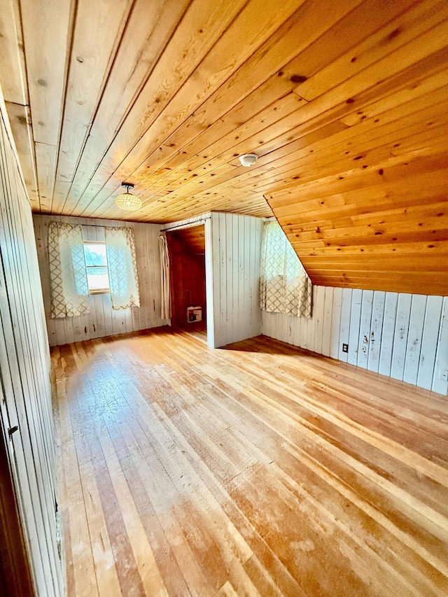 4691 2nd St, Caledonia, MI 49316 - additional living space featuring wood-type flooring, wooden ceiling, and wooden walls