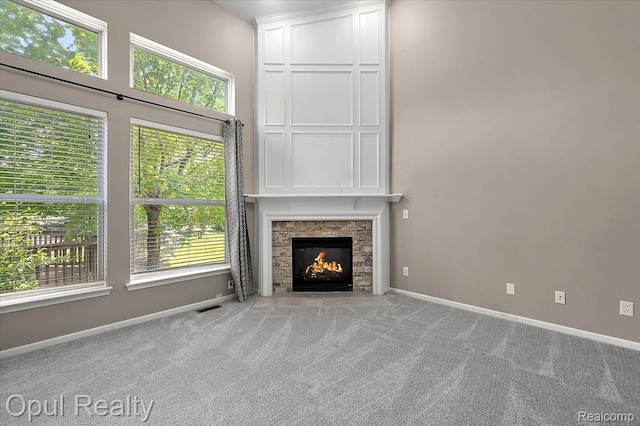 1978 Frances Way, Ypsilanti, MI 48198 - unfurnished living room with healthy amount of natural light, carpet floors, and a fireplace