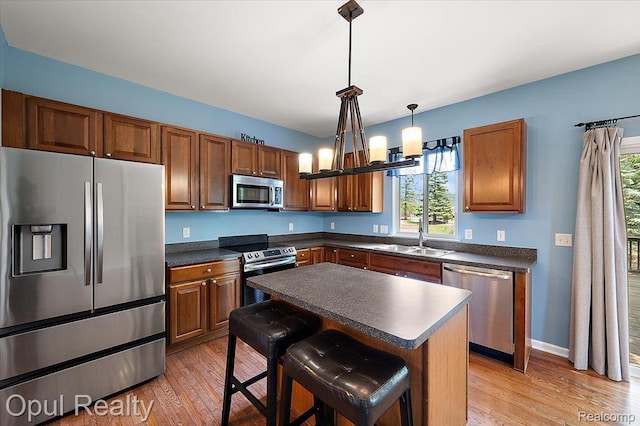1978 Frances Way, Ypsilanti, MI 48198 - kitchen with appliances with stainless steel finishes, plenty of natural light, and dark countertops